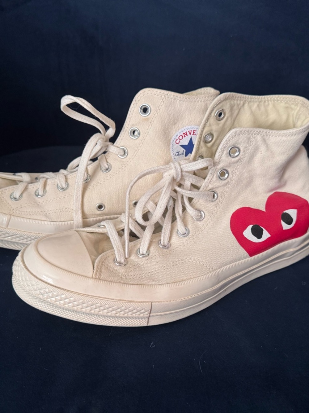Converse x Comme des Garçons PLAY Chuck 70 high-top sneakers.